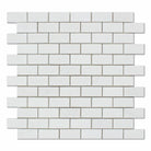 Close-up of Thassos White 1x2 mosaic showing polished marble finish