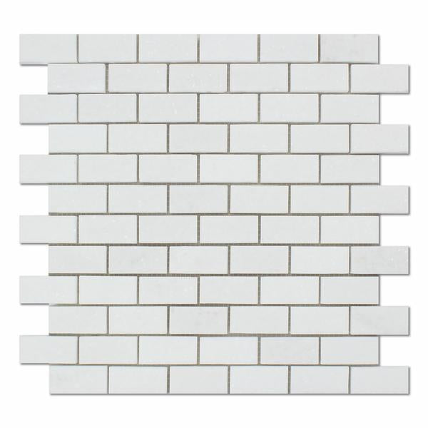 Close-up of Thassos White 1x2 mosaic showing polished marble finish
