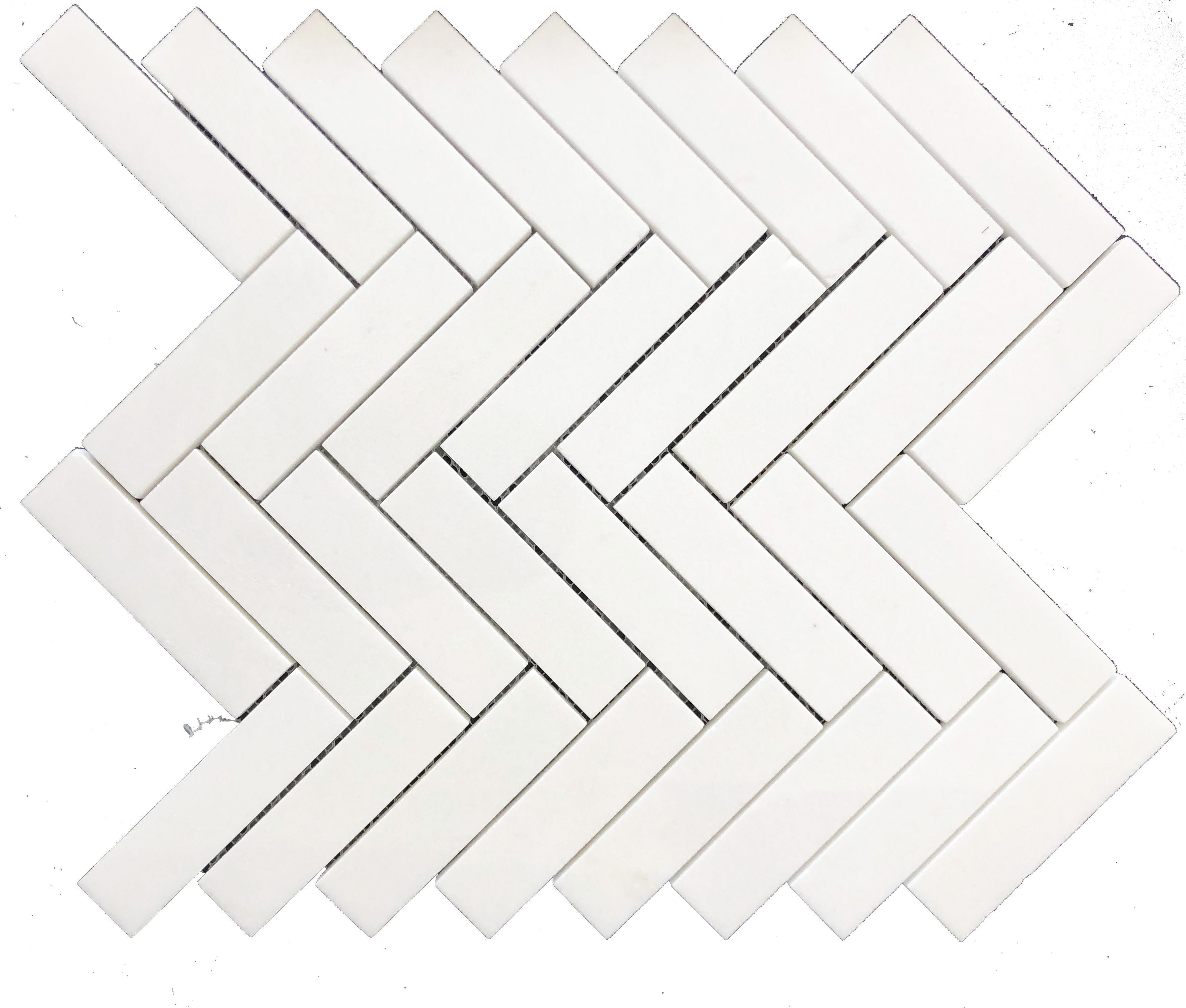 Close-up of Thassos White Herringbone pattern showing 1x4 marble tiles