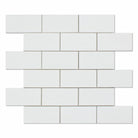 Close-up of polished Thassos White 2x4 marble mosaic tiles