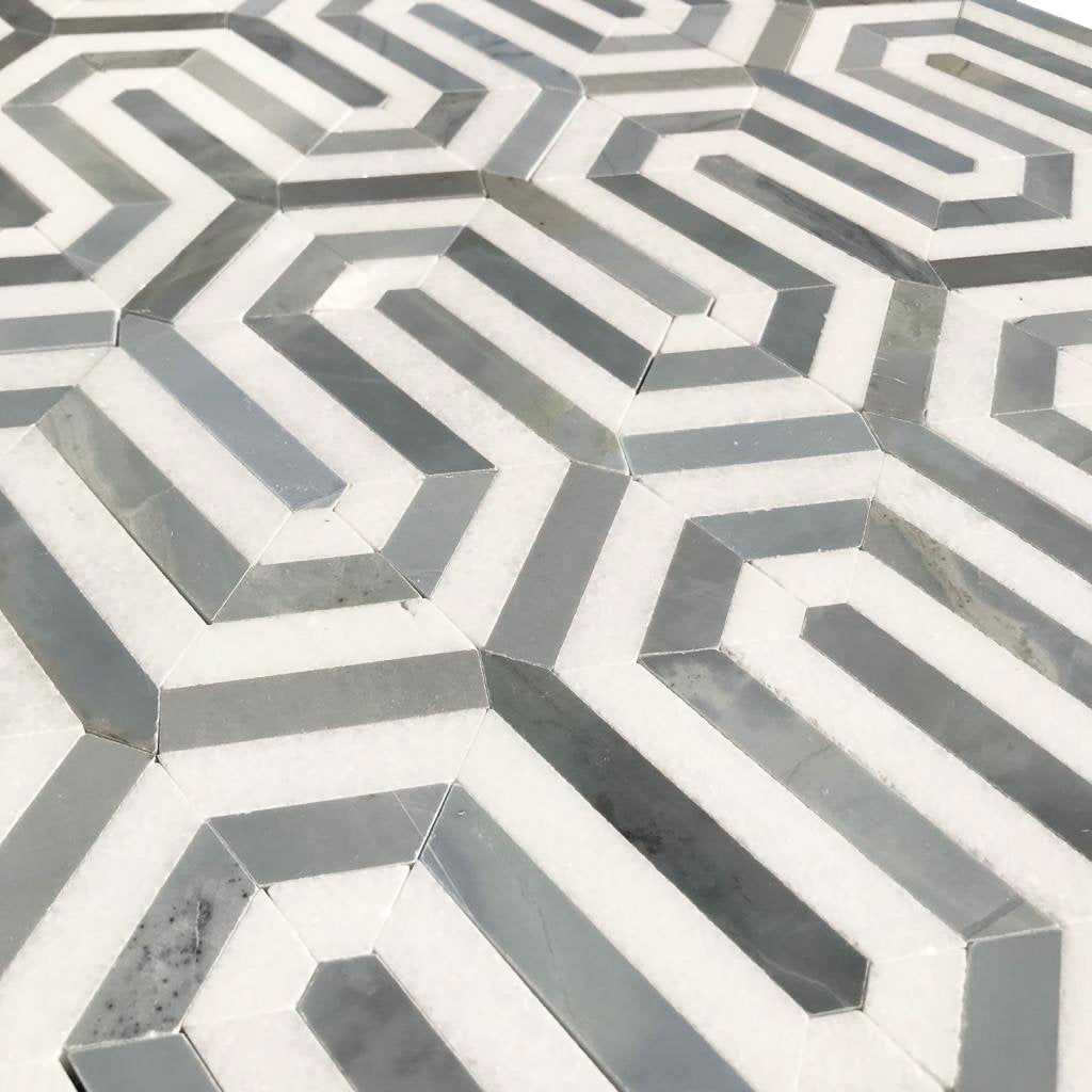 Close-up of Thassos White Berlinetta Blue showing polished blue accent and white marble