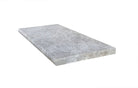 Top view of Tundra Grey Marble Pool Coping 12x24 with tumbled surface and bullnose edge