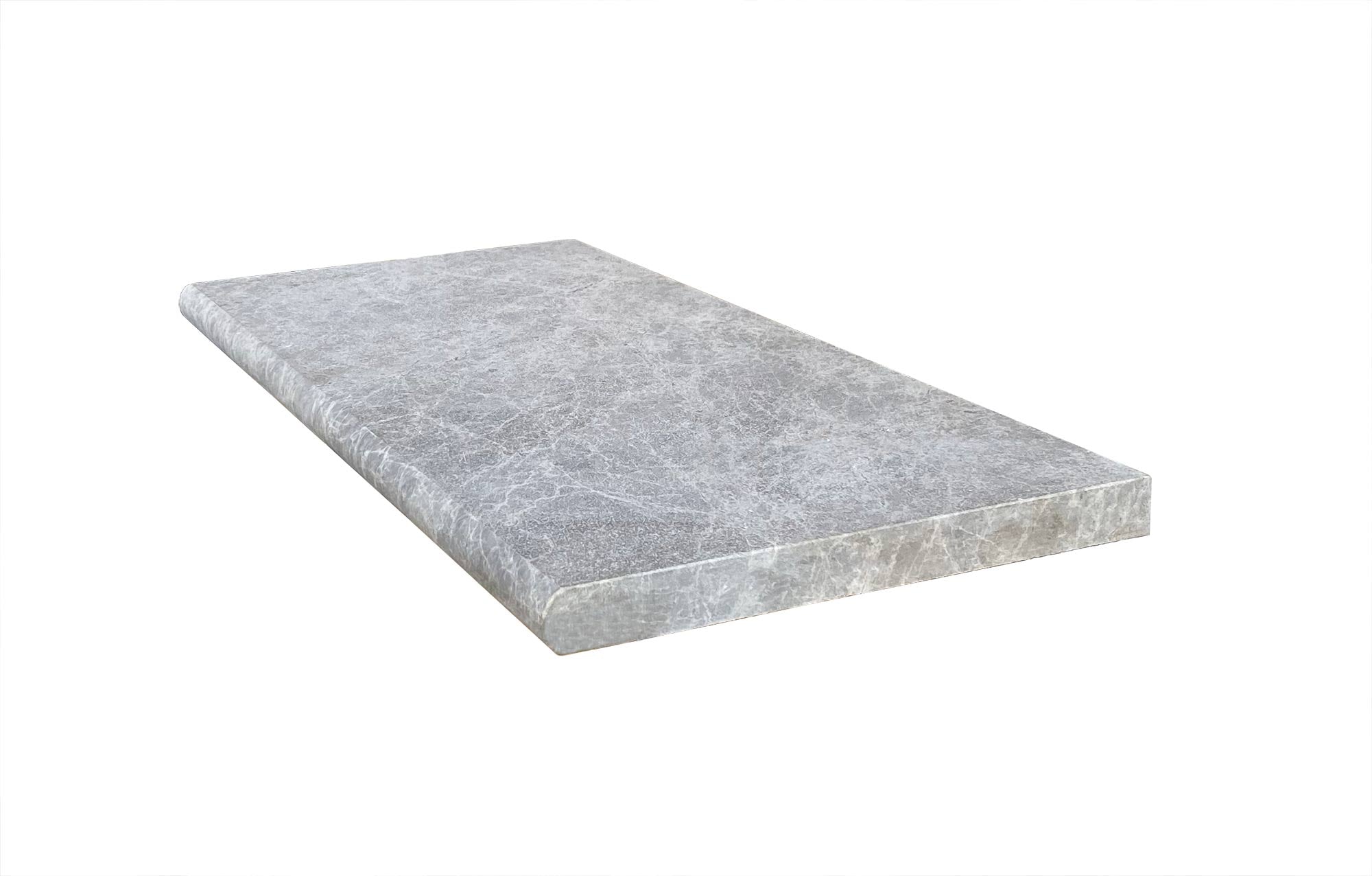 Top view of Tundra Grey Marble Pool Coping 12x24 with tumbled surface and bullnose edge