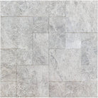Tundra Grey Marble pavers in Roman pattern with leathered finish