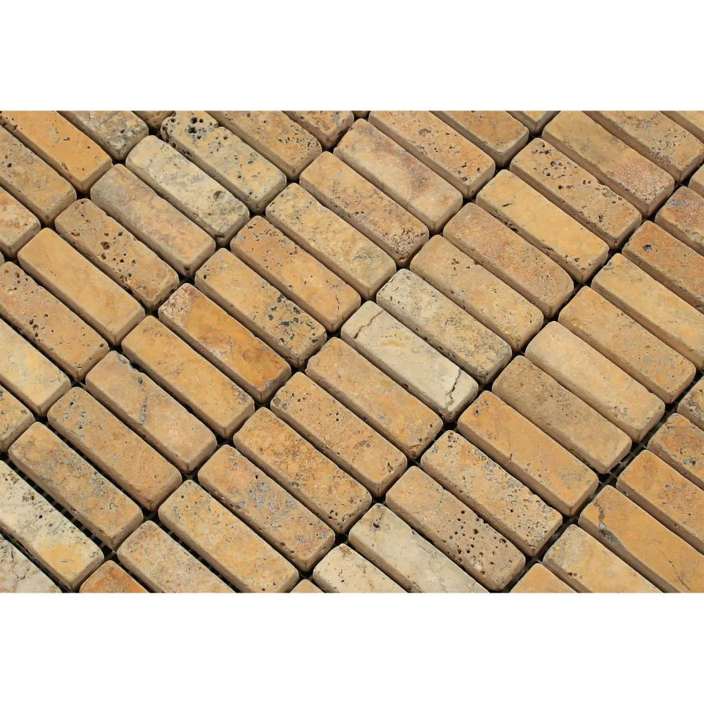 Detail of Tuscany Gold 5/8x2 mosaic tiles showing tumbled edges and natural variation