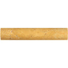 Close-up of quarter round travertine molding with curved profile and soft golden tones