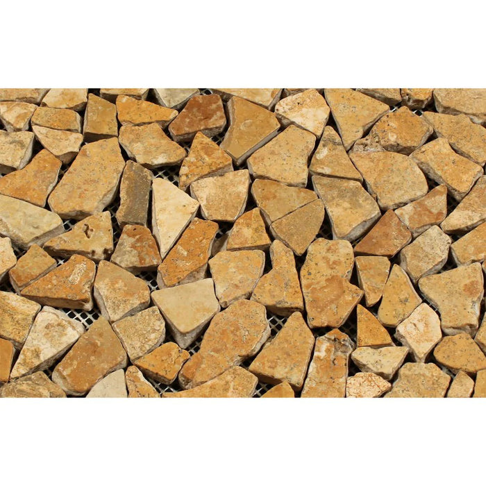 Close-up of Tuscany Gold Tumbled Random Mosaic showing irregular stone shapes and texture