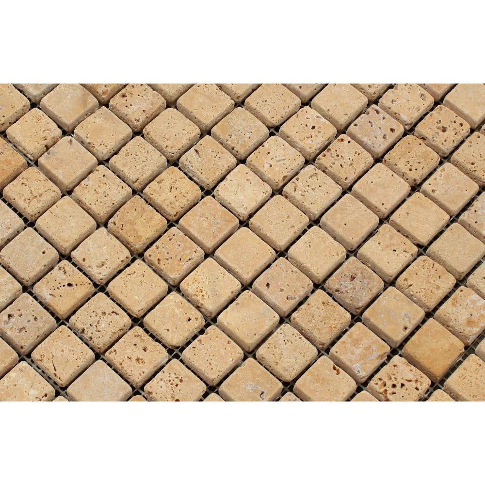 Close-up of Tuscany Gold 1x1 travertine mosaic showing rustic finish and soft edges