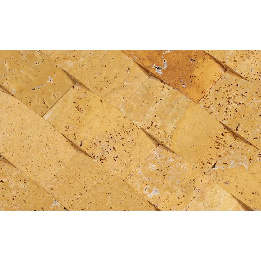 Close-up of CNC-arched 2x4 travertine mosaic in Tuscany Gold tones and honed finish