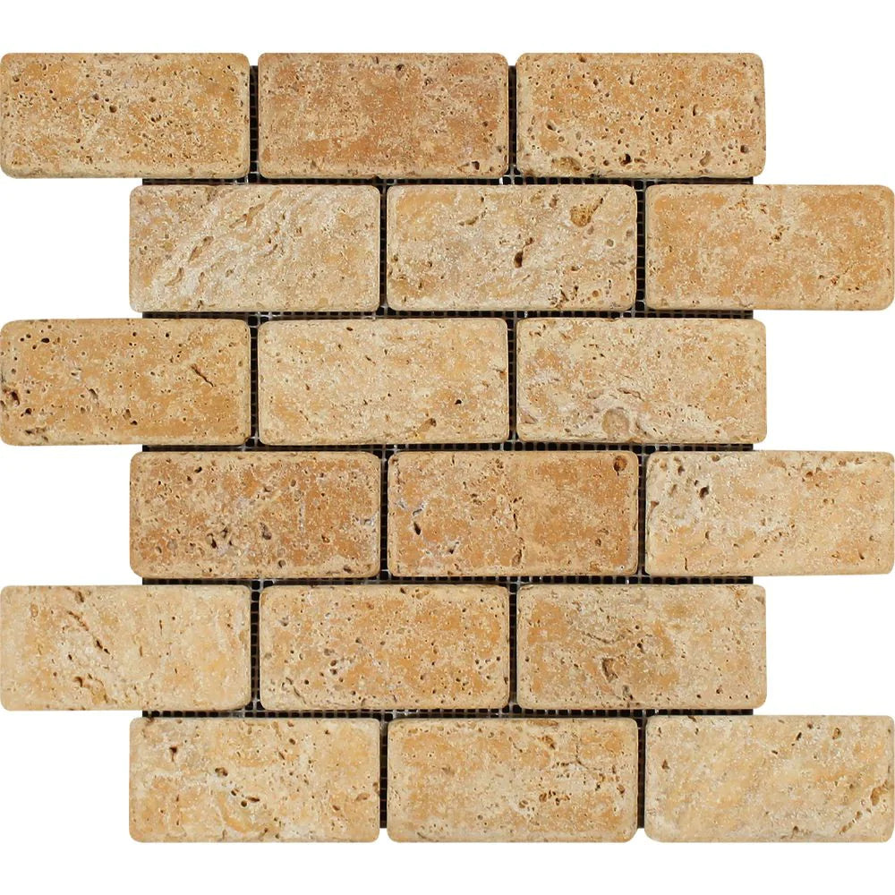 Tuscany Gold Travertine 2x4 mosaic tiles in tumbled finish on 12x12 mesh sheet
