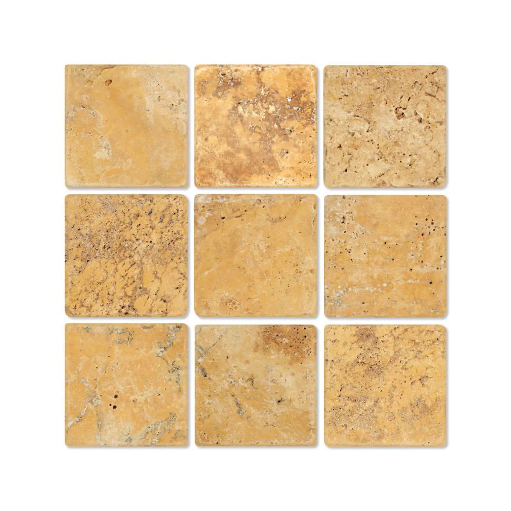 Flat lay of Tuscany Gold Travertine 4x4 Tumbled Tile with natural stone texture