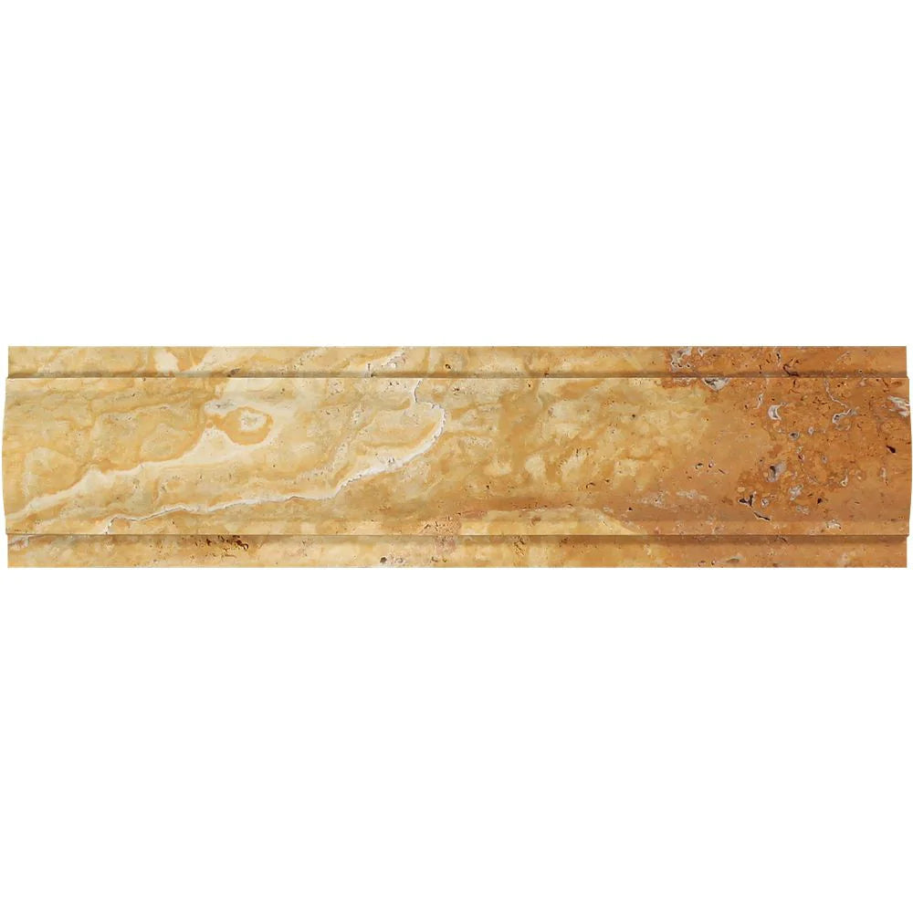 Close-up of arched Tuscany Gold molding showing honed surface and warm tones