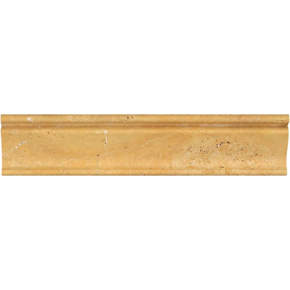 Close-up of natural stone crown molding in Tuscany Gold Travertine showing veining and profile