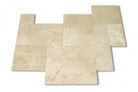 Close-up of Tuscany Ivory Travertine paver showing soft ivory tones and texture