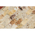 Close-up of 1x2 Valencia Travertine split face mosaic tiles showing rough texture and warm color