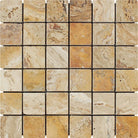 Flat view of Valencia Travertine 2x2 Tumbled Mosaic on mesh sheet, showing beige and rust color mix