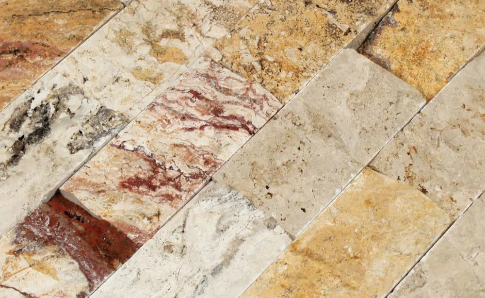 Close-up of mesh-mounted 2x4 brick split face Valencia Travertine mosaic with warm tones