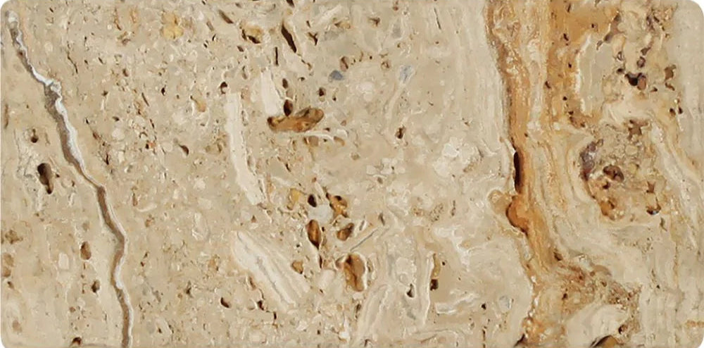 Close-up of 3x6 Valencia Travertine tile with tumbled finish and textured surface