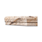 Close-up of honed Valencia Travertine shower shelf with smooth surface and soft edges